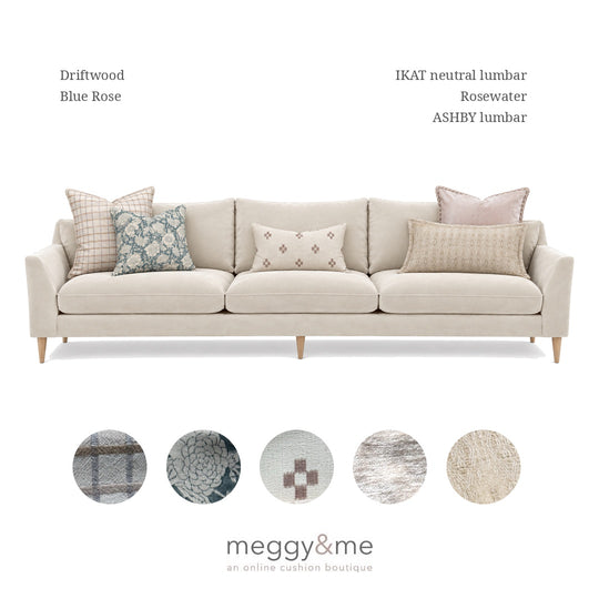 Ashby lumbar styled on a cream sofa with Driftwood, Blue Rose, IKAT neutral lumbar and Rosewater
