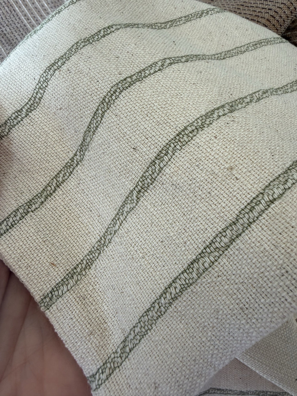 Close-up of MARTY green striped weave