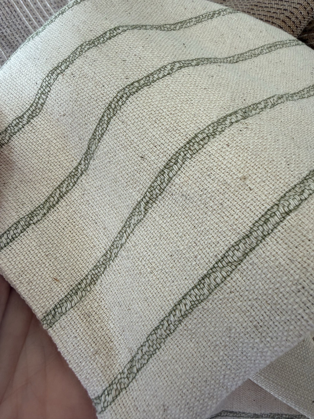 Close-up of MARTY green striped weave