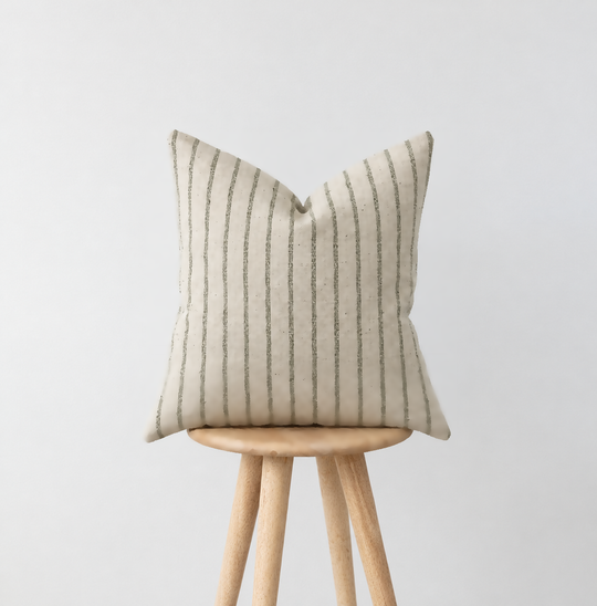 MARTY green striped cushion on a wooden stool